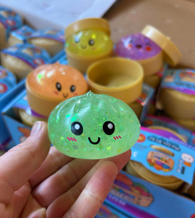 Mini 5,5 cm Glitter Squishy Dumpling - 1x Surprise kleur Squeezy